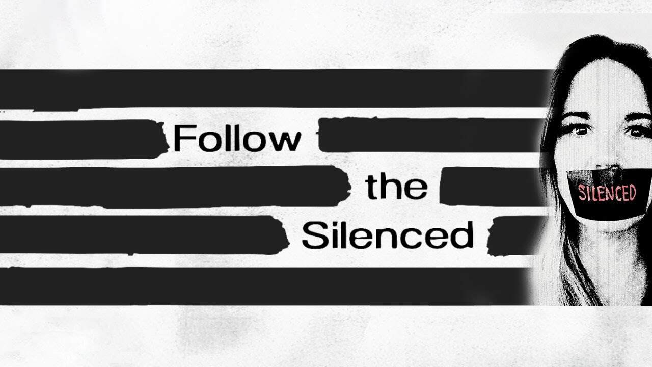 Woman with tape over her mouth labeled 'Silenced' for awareness.